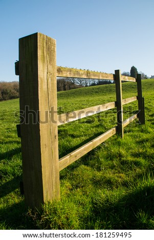 The wooden fence in rural Parbold, England on a beautiful spring day.