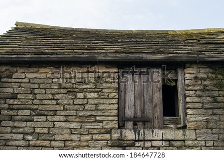 Exterior of old 1700's rural barn house in Northwest England.