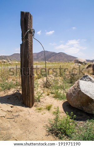 The wooden post in the Southern California desert.