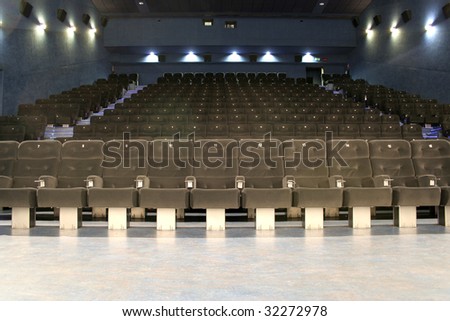 Theater chairs, empty seats after/before the show.