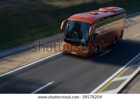 speed red bus on highway