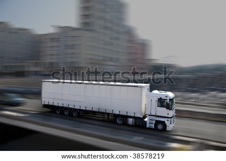 white semi-truck in town