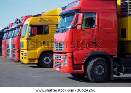 yellow and red semi trucks