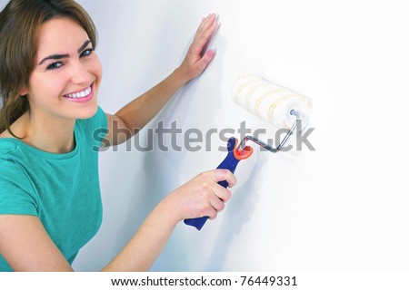 woman with painting tools portrait woman painting. woman with painting tools