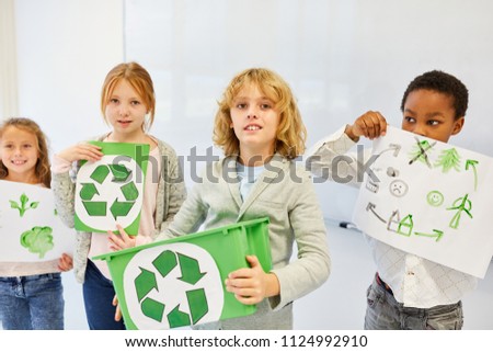 Children as elementary school creative team are planning a recycling ecology project