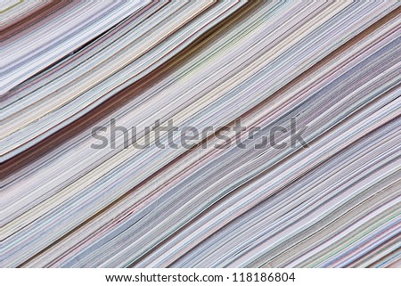 Abstract newspaper background made from a stock of magazines