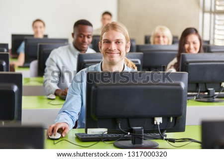 Students in computer seminar in IT training class