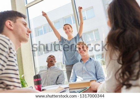 Student celebrate with joy after successful test in the uni