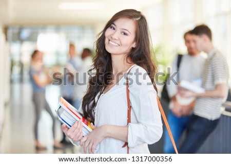 Woman as happy asian student in the uni
