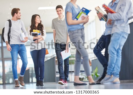 Students in university hallway during class break