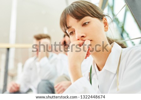 Young woman as medicine student think about problem