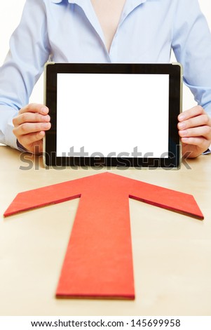 Red arrow pointing to tablet computer with empty white screen