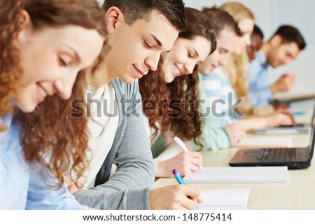 Students Taking Exam In Seminar Of An University