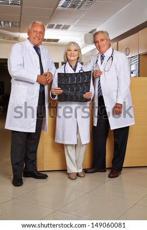 Group of doctors with x-ray image in a hospital