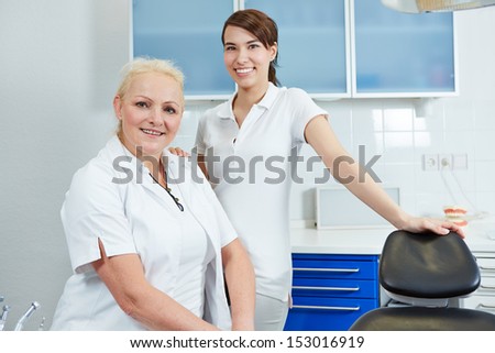 Portrait of female dentist and dental assistant in their dental practice