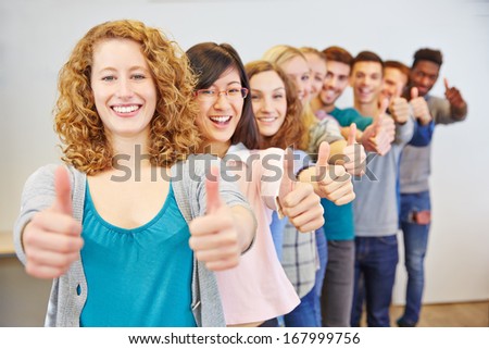 Happy group of many teenager congratulating with thumbs up