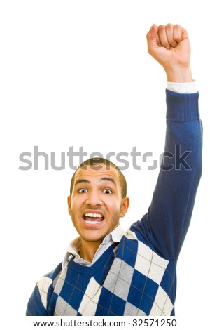 Young man is cheering with his fist in the air