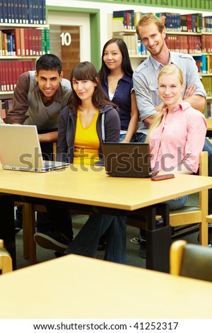 Group of students learning in library at university