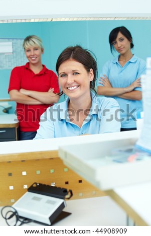 Three dental technicians in a dental laboratory