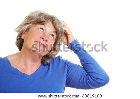 A forgetful elderly woman scratching her head