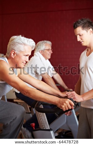 Fitness trainer coaching a class