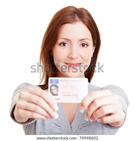 Happy young teenage girl with a European driving license from Germany