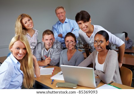 Students and teacher in course at university