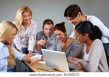 Studients doing group work in university class
