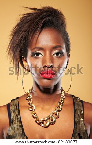 Head shot portrait of young serious african woman