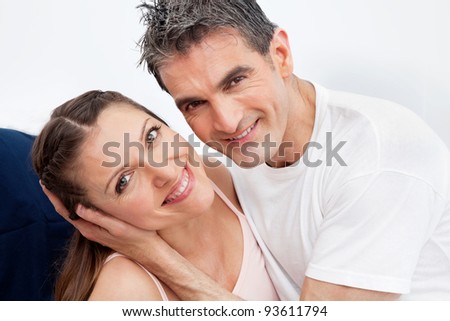 http://image.shutterstock.com/display_pic_with_logo/183121/183121,1327484785,1/stock-photo-happy-smiling-married-couple-having-fun-in-bed-93611794.jpg