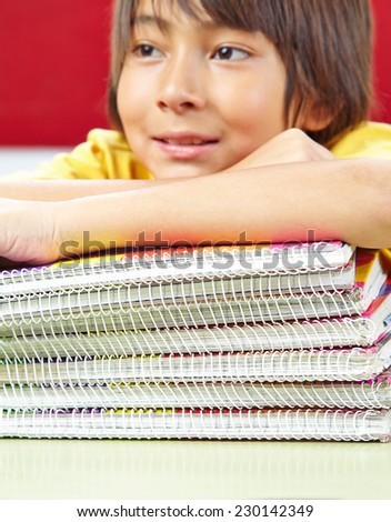 Japanese student with notebooks with spiral binding in school