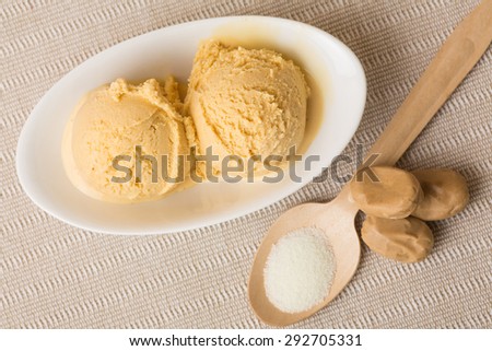 Two scoops of homemade salted caramel ice cream from above