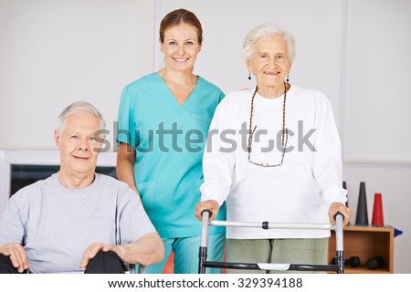 Two old senior people in nursing home with a geriatric nurse
