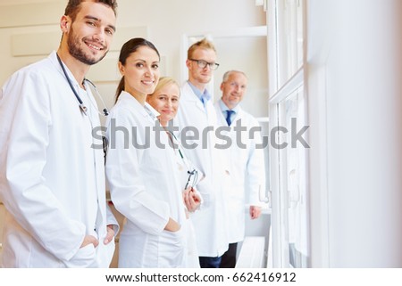Medical clinic staff with group of doctors and assistants