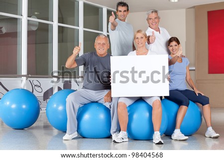Advertising for back training in gym with happy senior fitness group