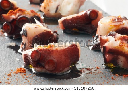 Some slices of octopus prepared at Galician style with olive oil, salt and paprika