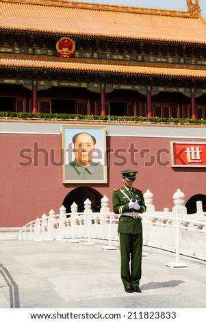 BEIJING, CHINA - APRIL 10,2013 : Chinese soldier stands guard in front of Tiananmen Gate on April 10, 2013. This gate as the principal entrance leading to the Forbidden City.
