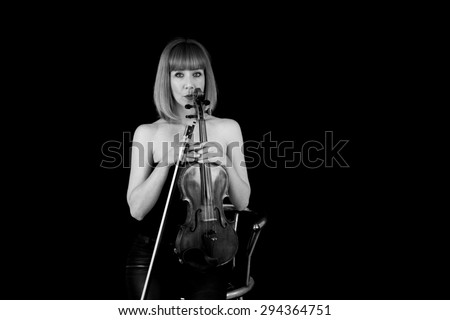 violin player woman with red hair B&W  isolated on black background