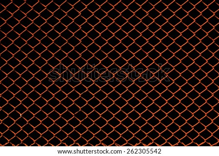 old rusty iron net with black background
