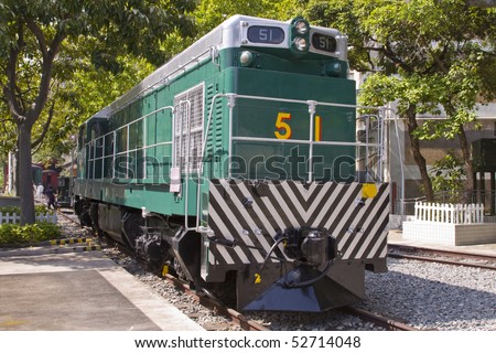 Old Locomotive train in green situated in Hong Kong, China