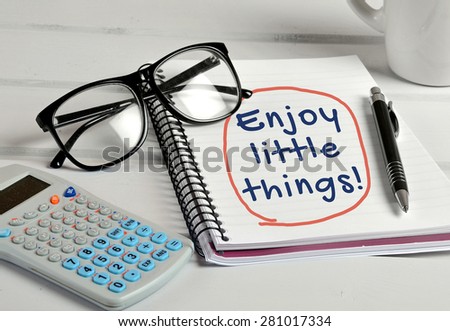 Enjoy the little things word on notebook page