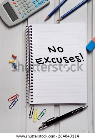 No Excuses word writing on paper