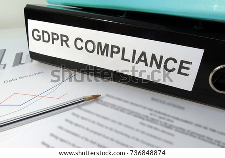 General Data Protection Regulation (GDPR) Compliance Lever Arch Folder on Cluttered Desk