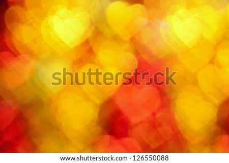background from golden and red hearts