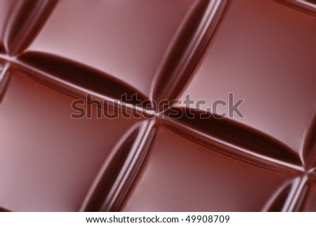 Clean photo of dark chocolate bar isolated on white