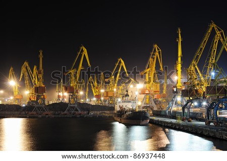 industrial port and ship at night