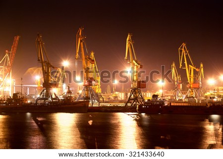 night view of the industrial port with cranes
