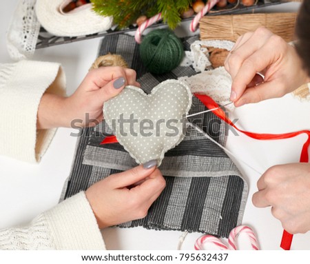couple making decorations for Valentine's day, recover damaged heart, top view - romantic and love concept