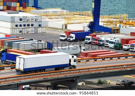 truck carries container to a warehouse near the sea truck carries container to a warehouse near the sea