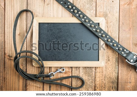 Collar and lead and blackboard